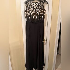Xcite black and nude prom dress